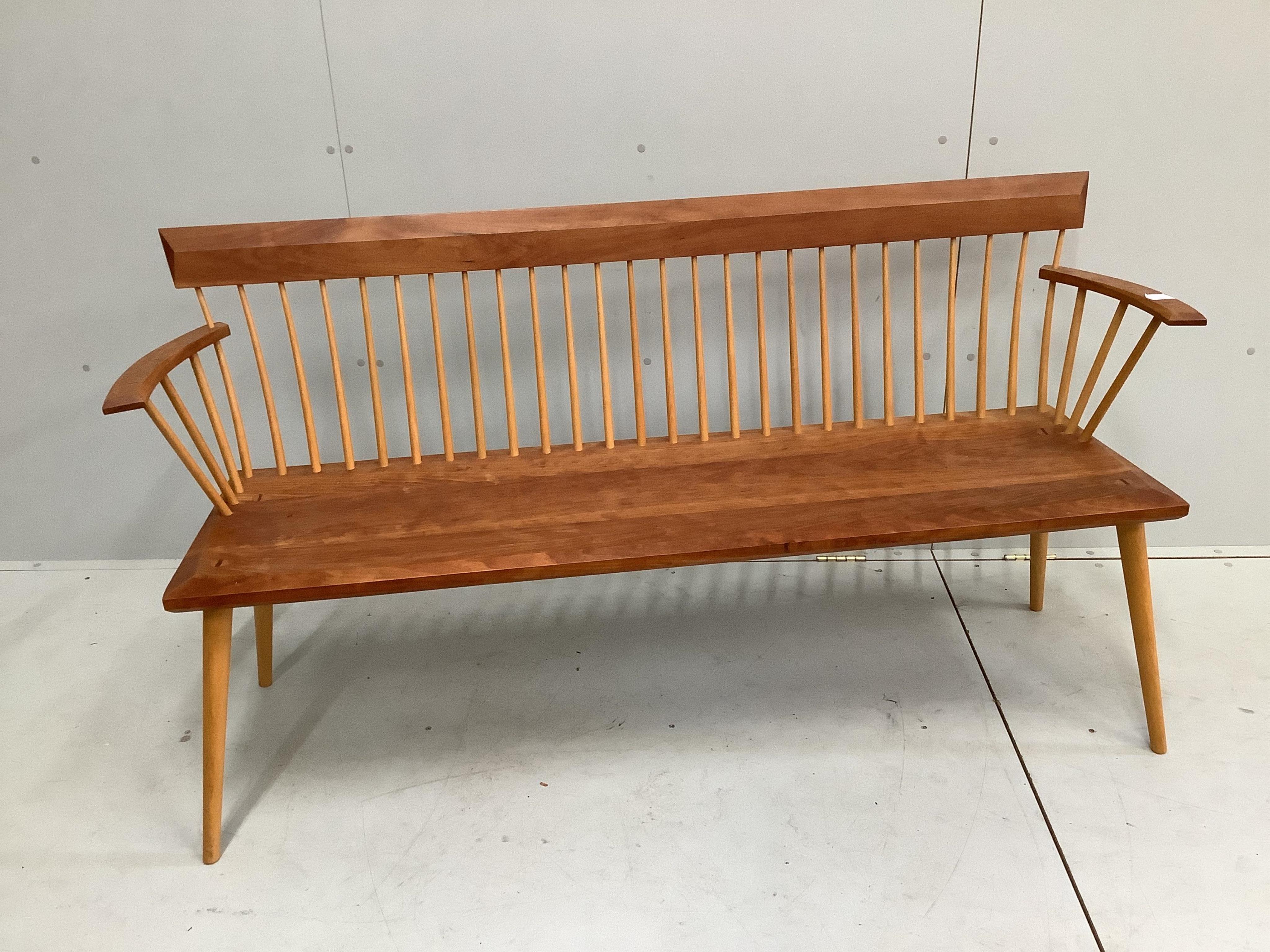 A Thomas Moser cherry wood 'Eastward' bench, width 165cm, depth 44cm, height 85cm. Condition - good